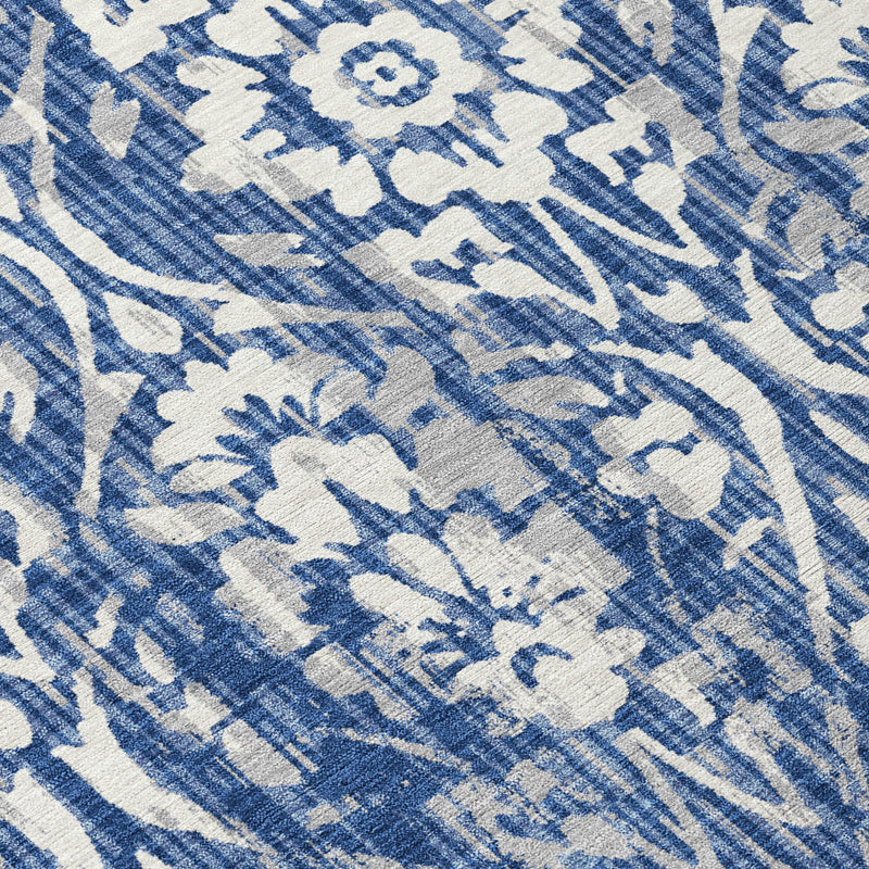 Blue and white damask area rug texture with distressed motif