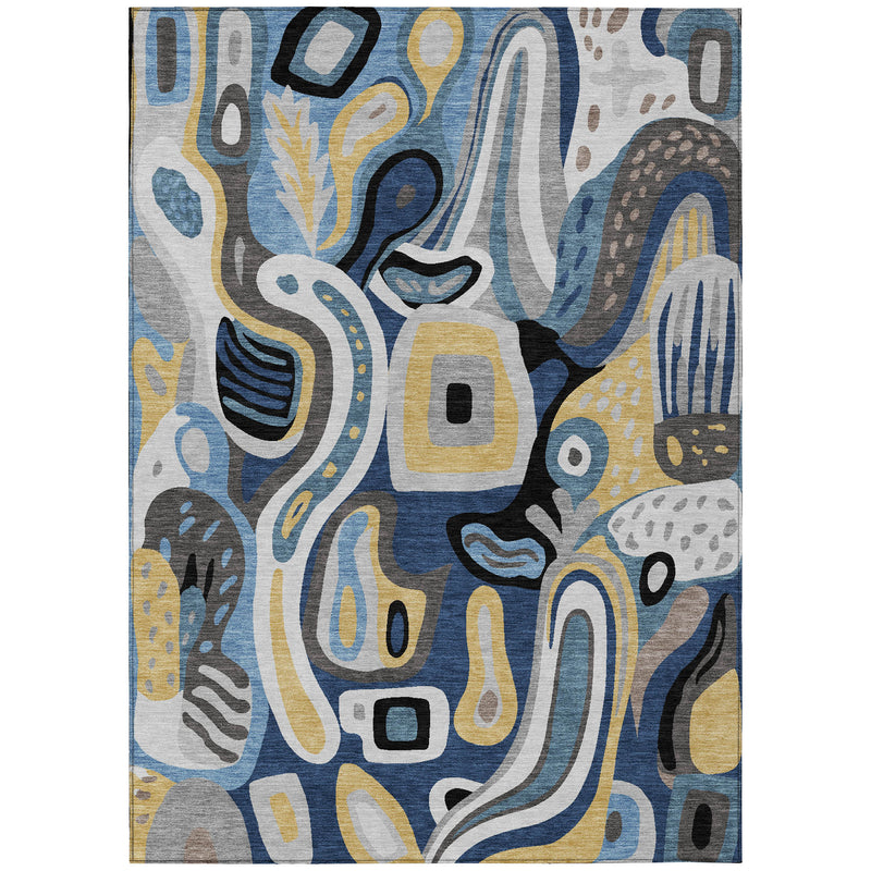 Abstract indoor outdoor area rug with blue and navy abstract shapes and yellow highlights