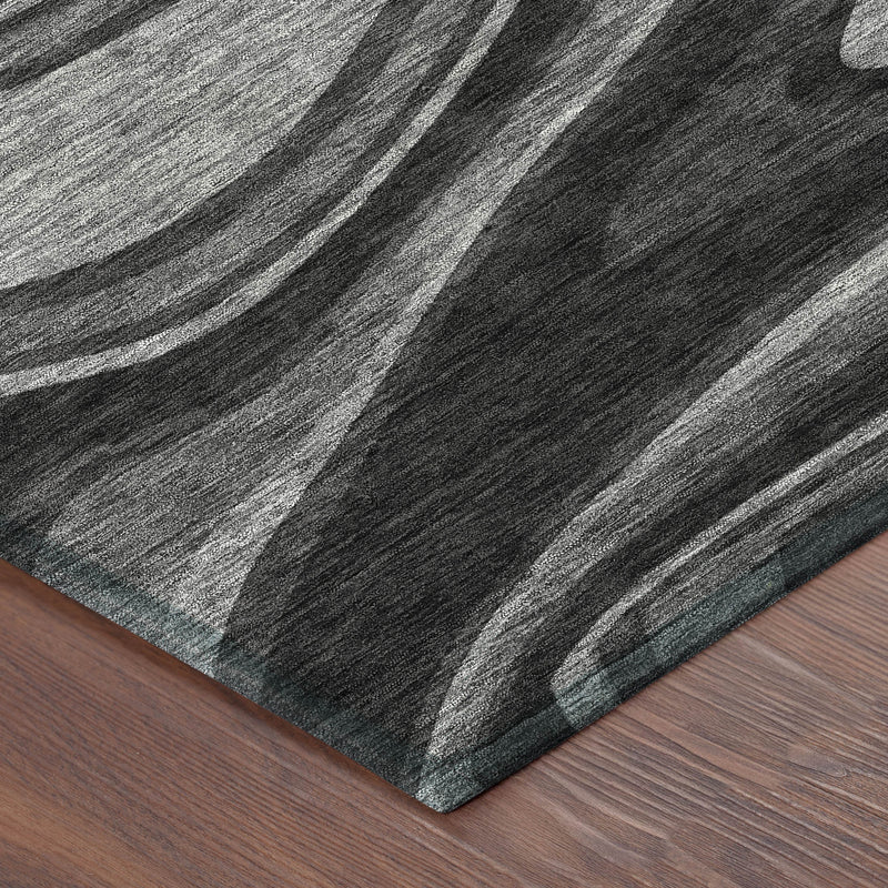 Charcoal and black abstract indoor outdoor rug with wavy lines and texture