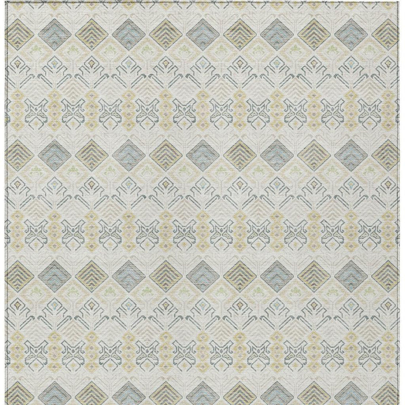 Flatweave area rug featuring an all-over geometric diamond pattern in ivory and muted blue