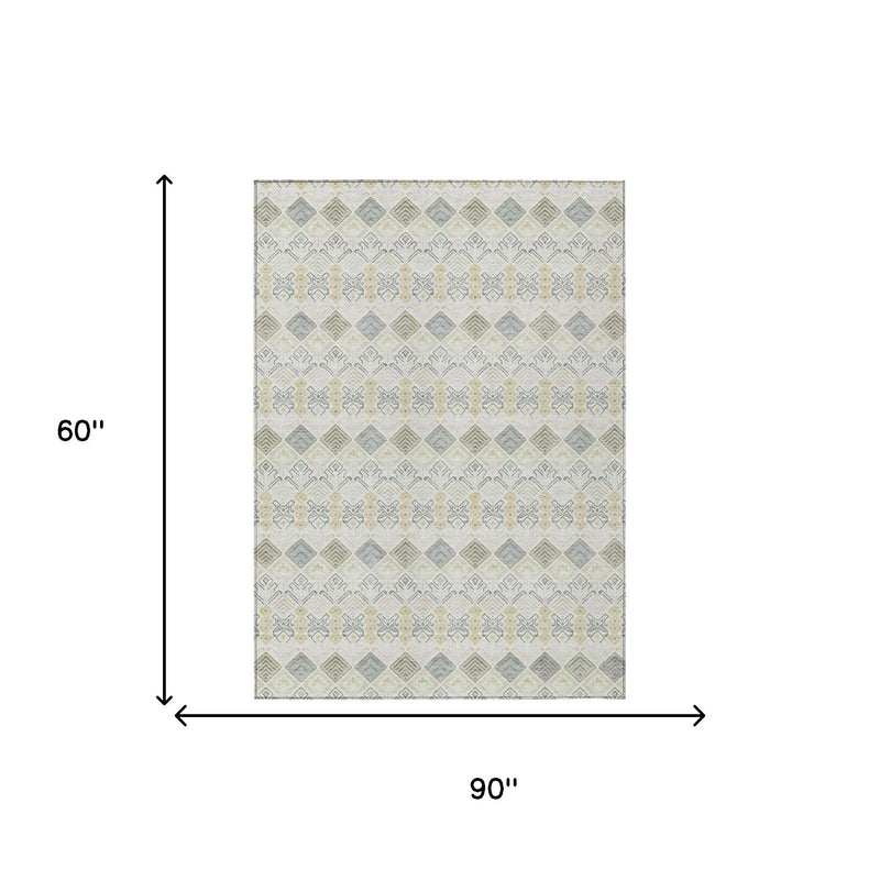 Ivory geometric washable area rug, 90 in x 60 in, wheat and blue design