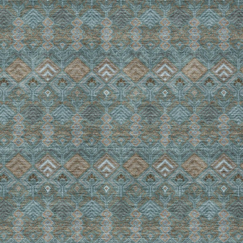 Teal blue geometric area rug with repeating diamond pattern in beige and charcoal