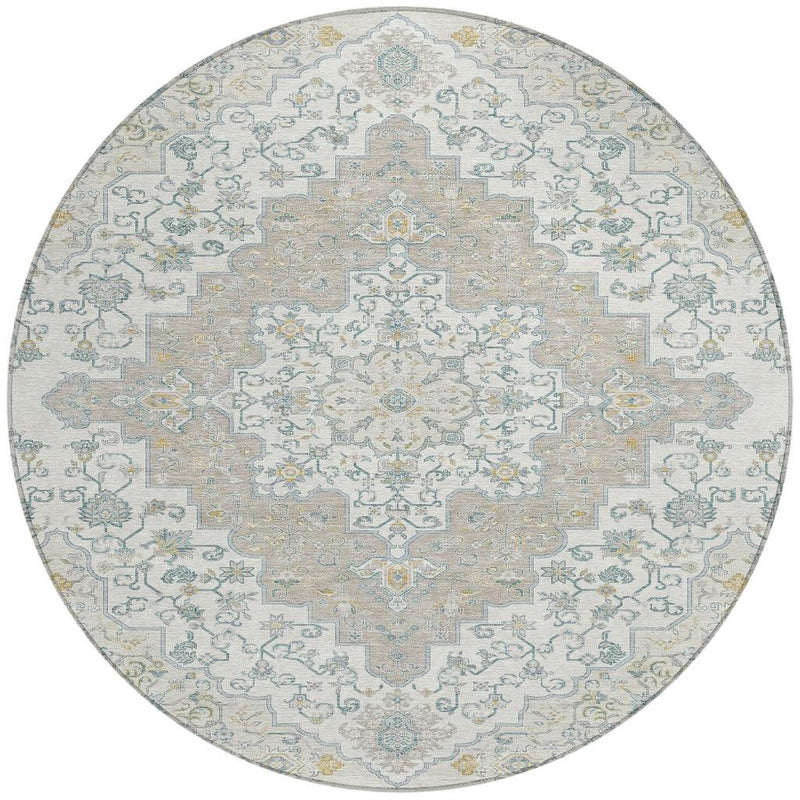Round rug with central medallion and scrolling motifs in blue, ivory, and taupe colors