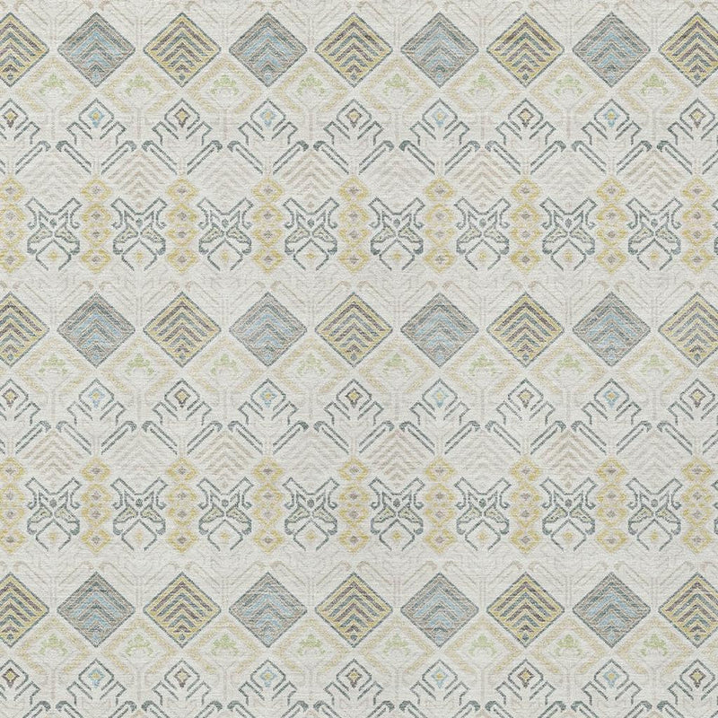 Textured ivory geometric area rug with diamond motifs in blue-gray, wheat, and gray