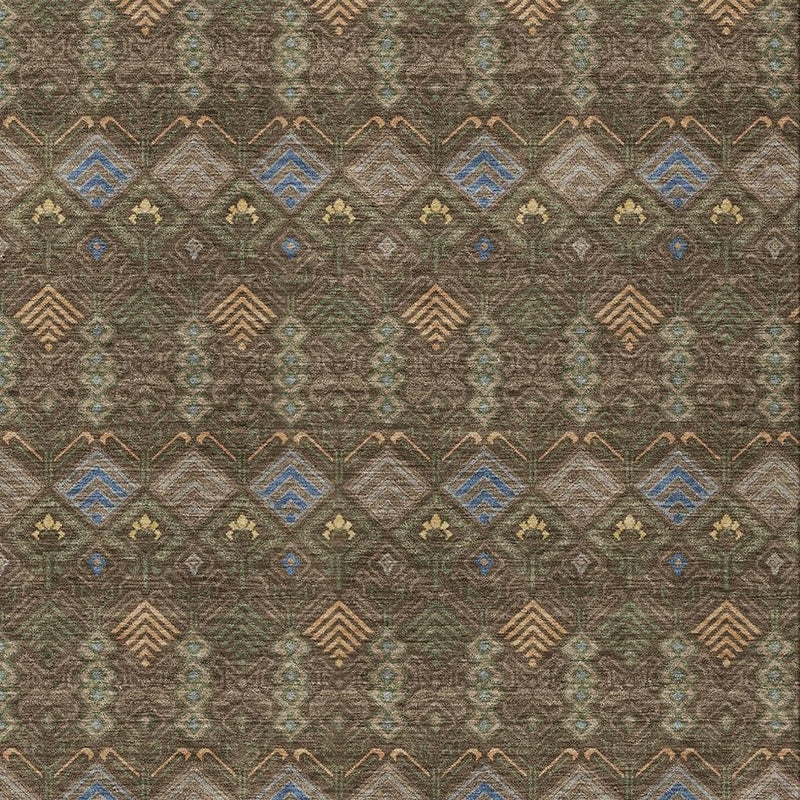 Geometric area rug with repeating diamond shapes in tan, blue, and green