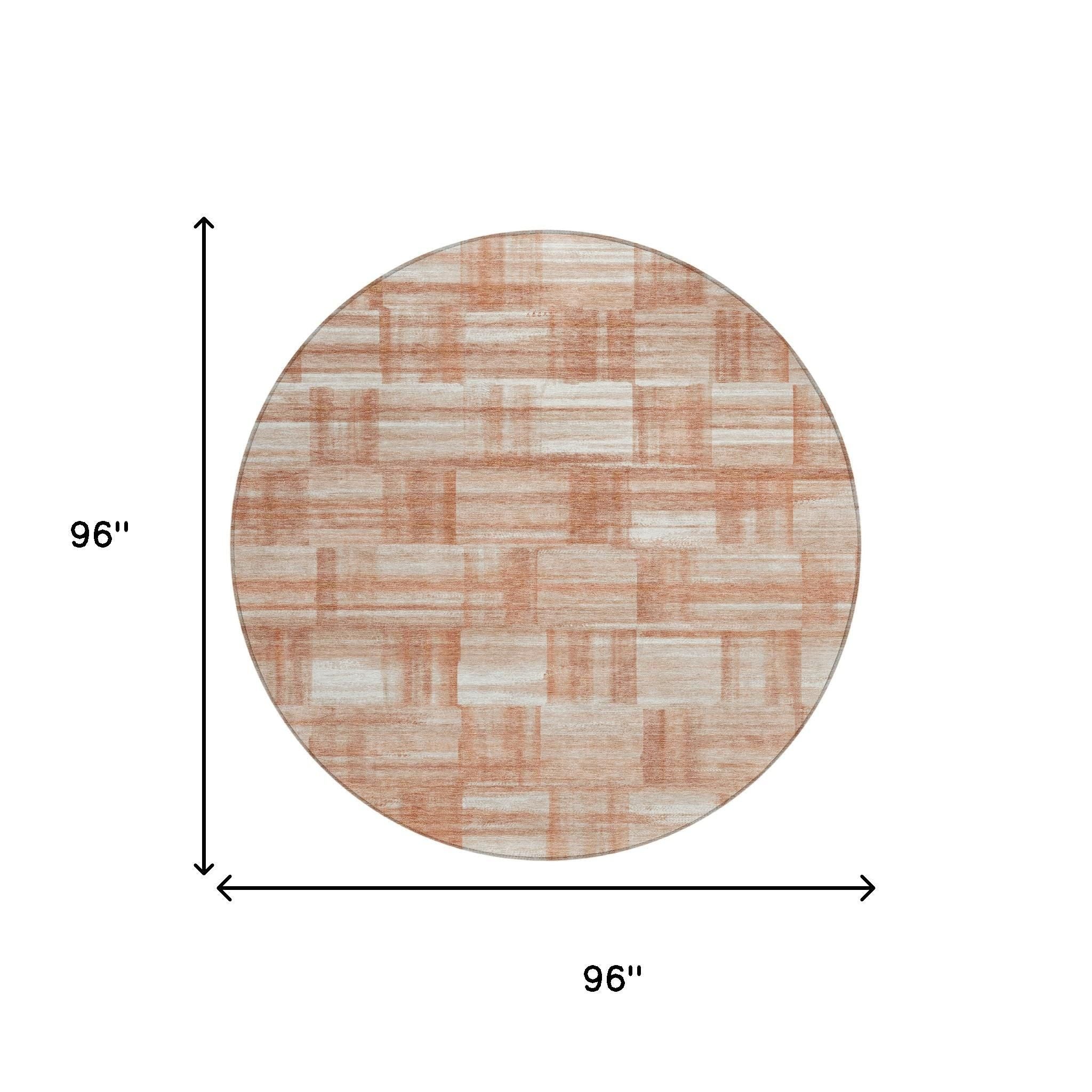 Round area rug with cream and salmon rectangle pattern and rust-copper edging