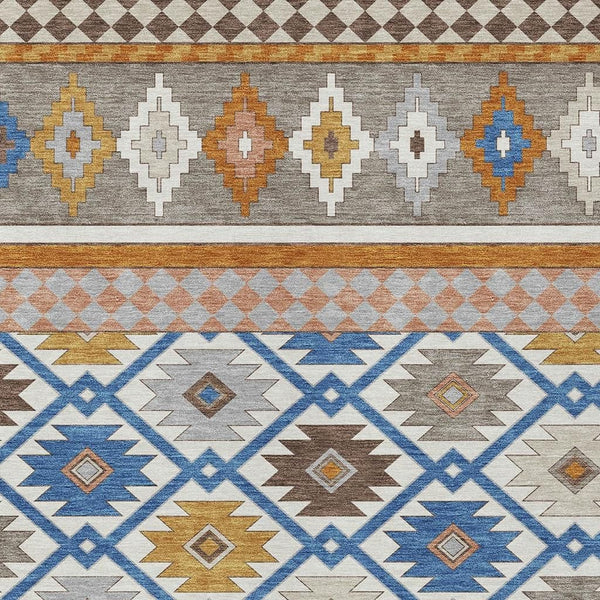 Southwestern area rug with gray, ivory, brown, and blue geometric motifs border