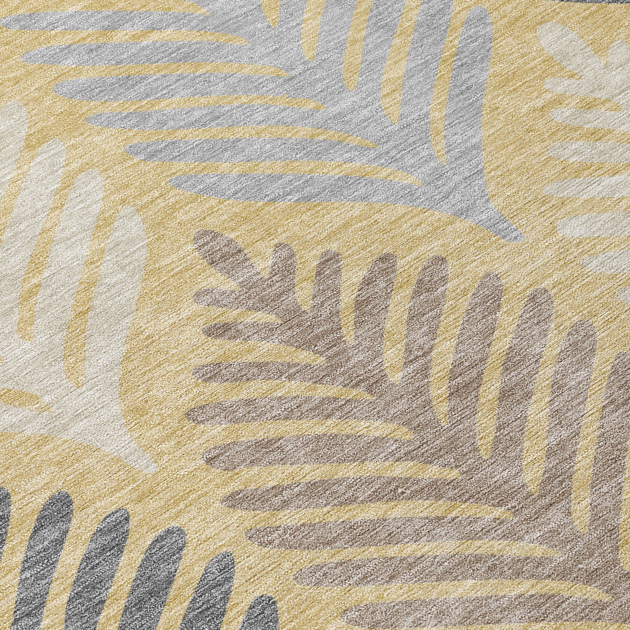 Ivory and gold leaf-pattern indoor/outdoor area rug with abstract feather motif