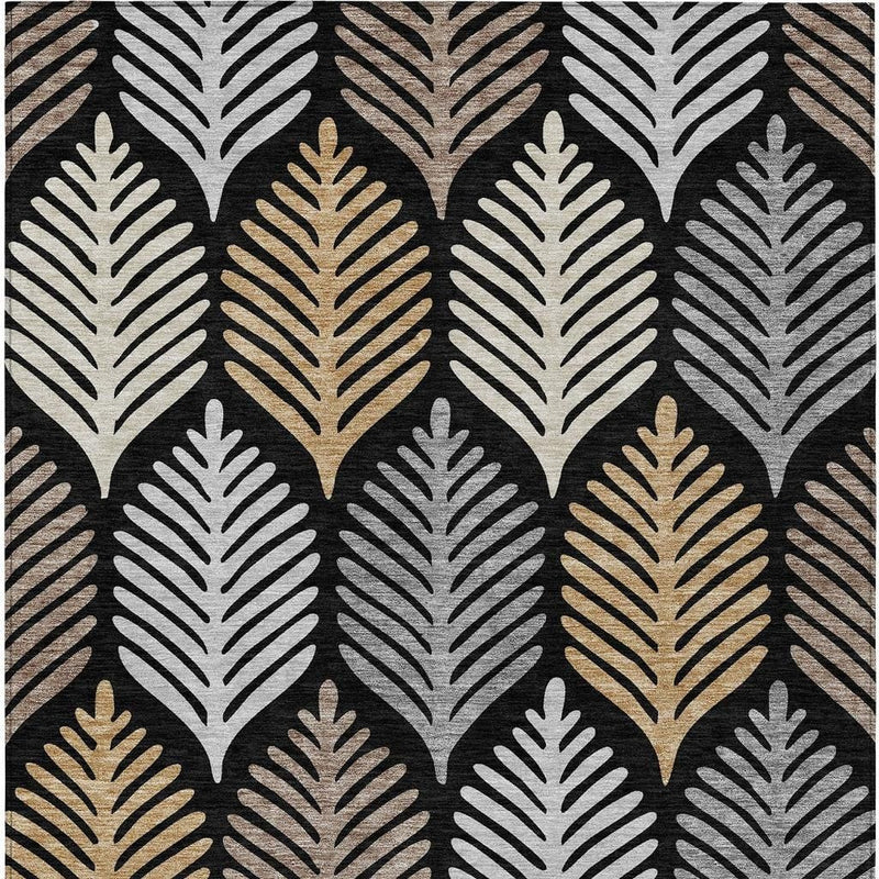 Rectangular black, gray, and beige leaf-pattern area rug with gold highlights.