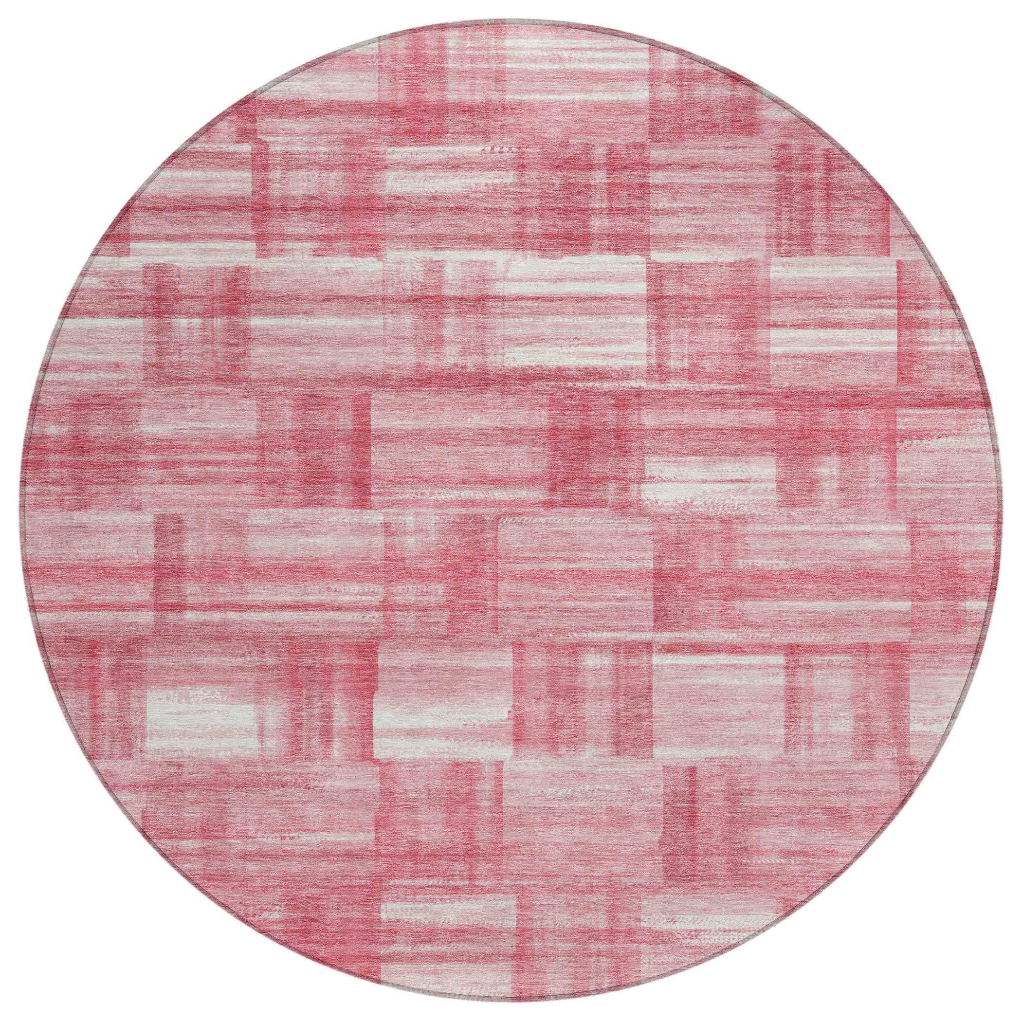 Round pink and ivory distressed patchwork area rug with soft grid lines
