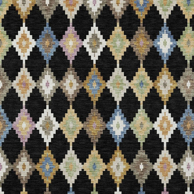 Rug with repeating Aztec-style diamond shapes in black, ivory, blue, and gold