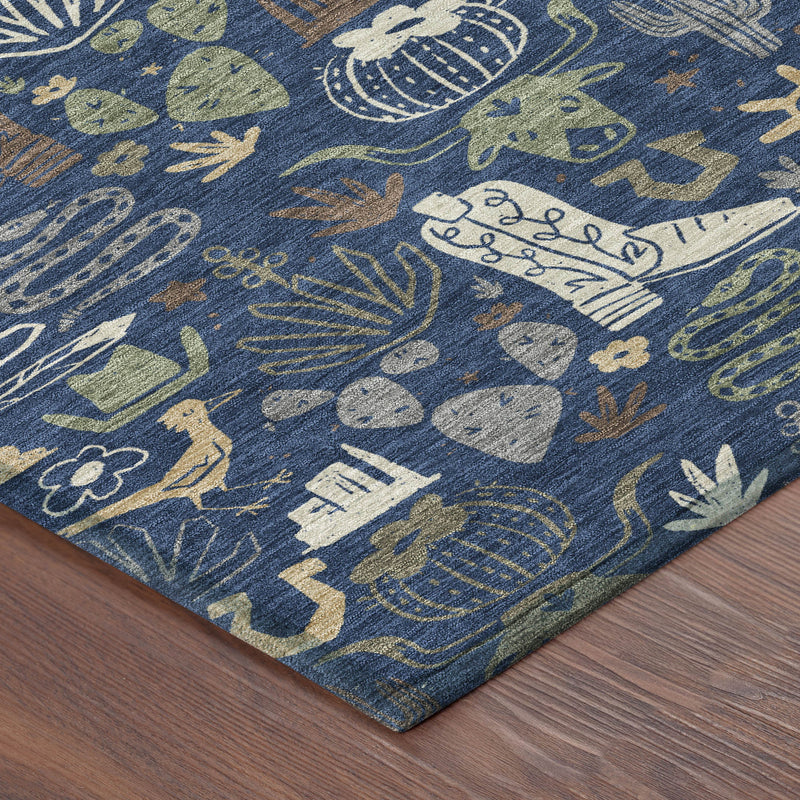 Navy and tan cactus-pattern area rug with distressed desert icon motifs