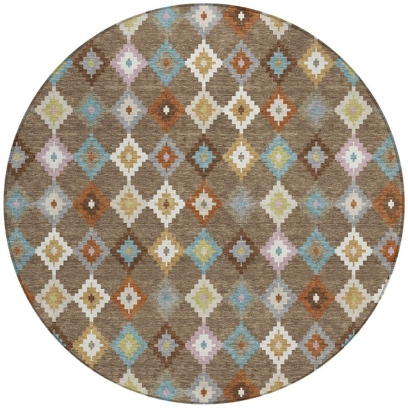 Round rug with taupe-brown background and colorful geometric diamond Aztec motif