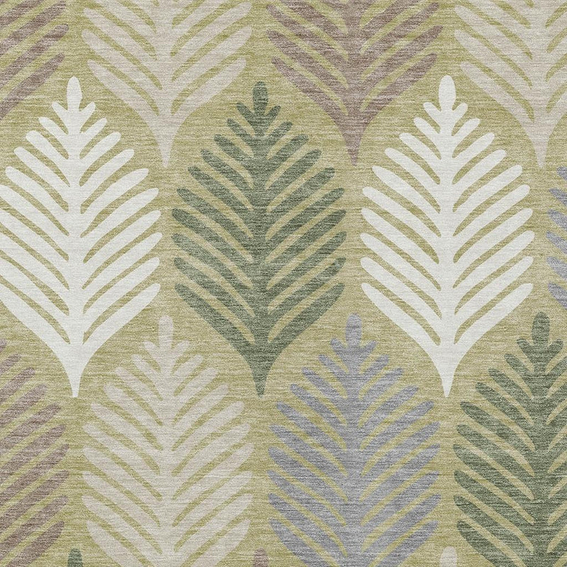 Area rug with repeating leaf silhouettes in ivory, sage green, and muted blue-gray tones