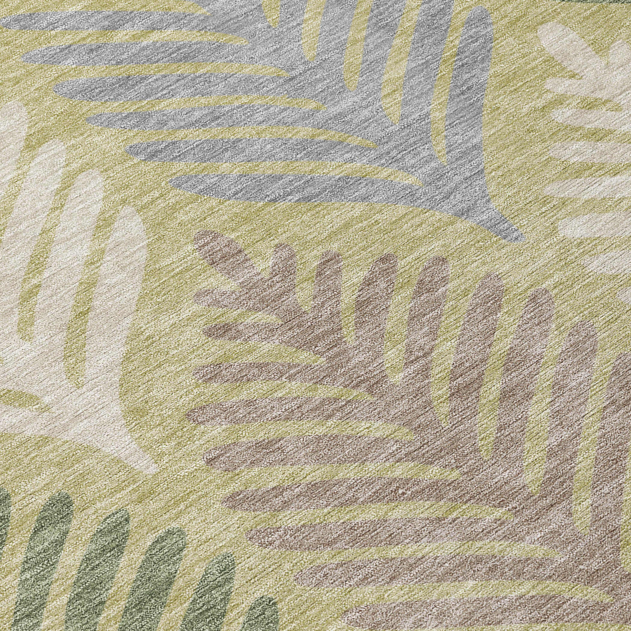 Close-up area rug showing textured leaf pattern in green, ivory, and taupe-gray