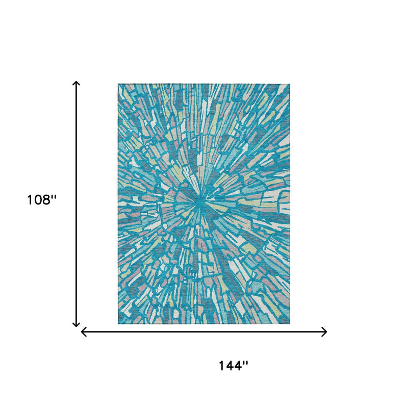 Area rug size 108 x 144 in shown with teal blue abstract radial burst pattern