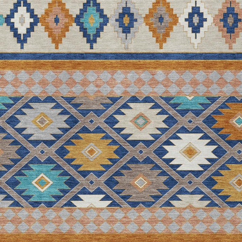 Southwestern area rug with repeating blue, tan, and teal geometric shapes and borders
