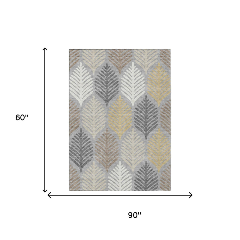 Rectangular area rug with gray, beige, and light blue leaf pattern, shown with dimensions