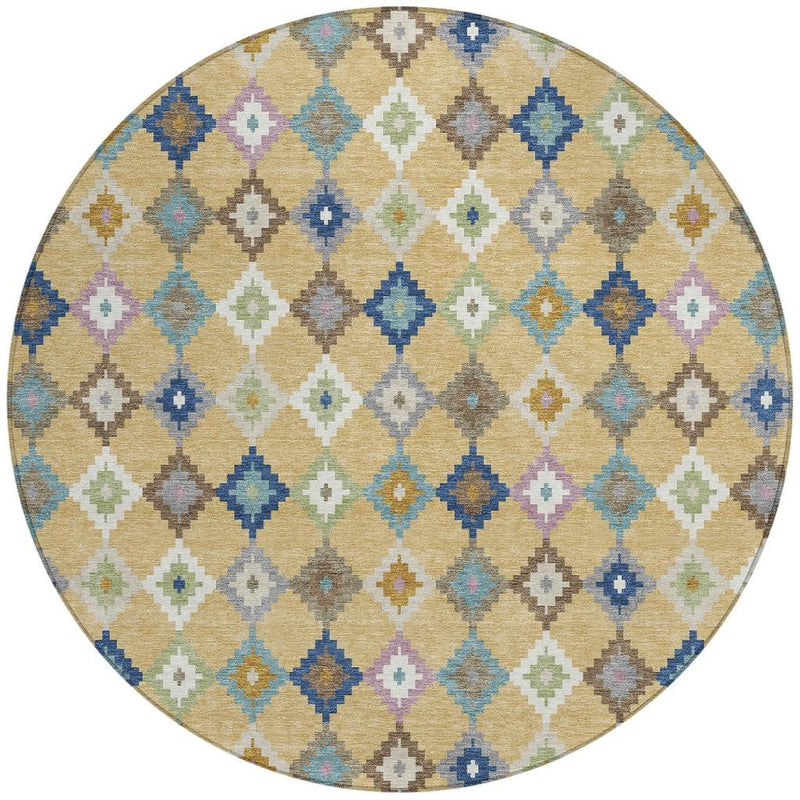 Round area rug top view with beige-gold geometric diamonds in blue, teal, and pink accents.