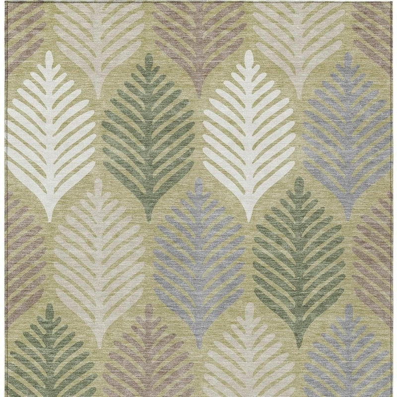 Area rug face with repeating leaf motifs in muted green and ivory, flat-woven texture
