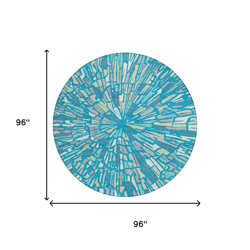 Round abstract area rug, teal-blue burst design, 96 in diameter (diagram).