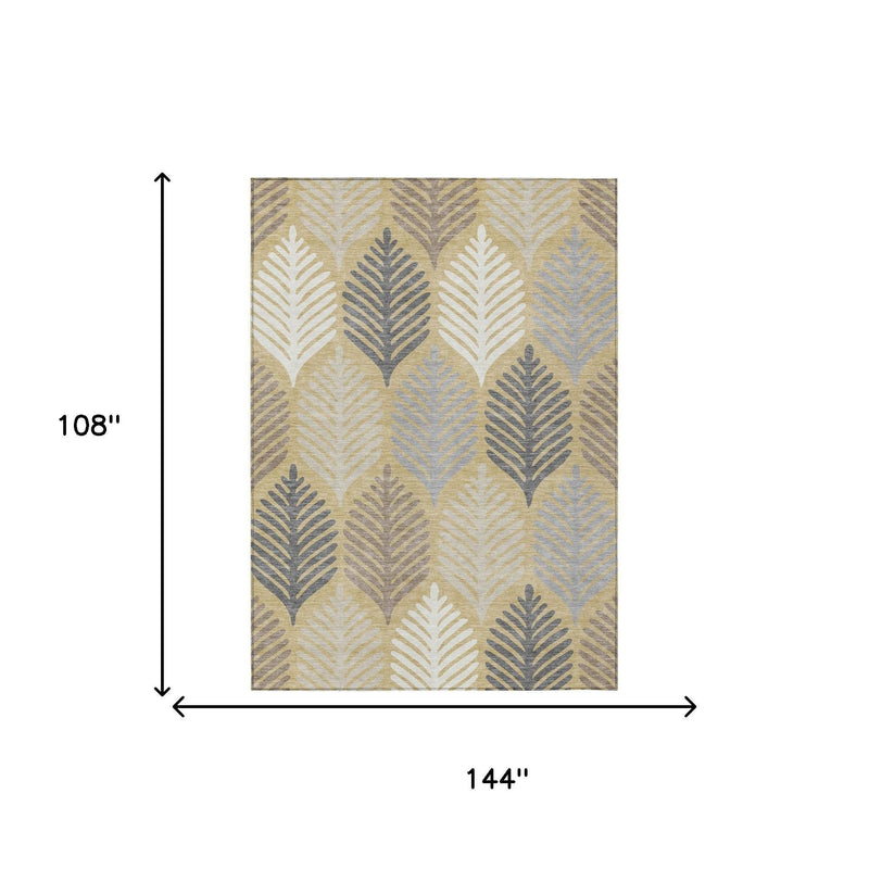 Indoor outdoor area rug with ivory and gold leaf pattern in gray accents