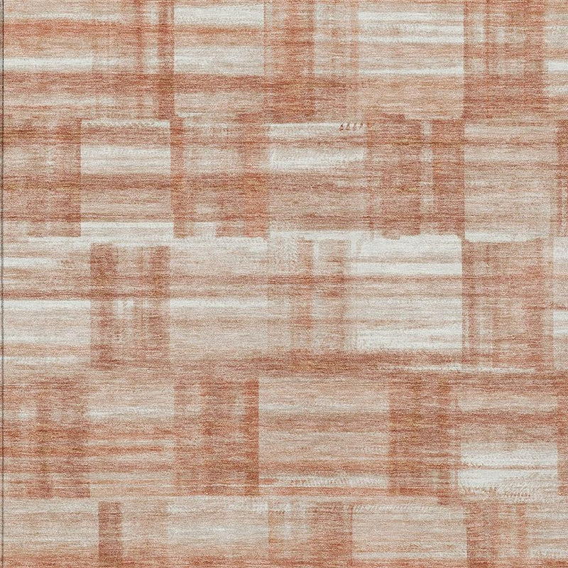 Rusty orange and cream textured area rug, stylish geometric pattern for modern home decor.