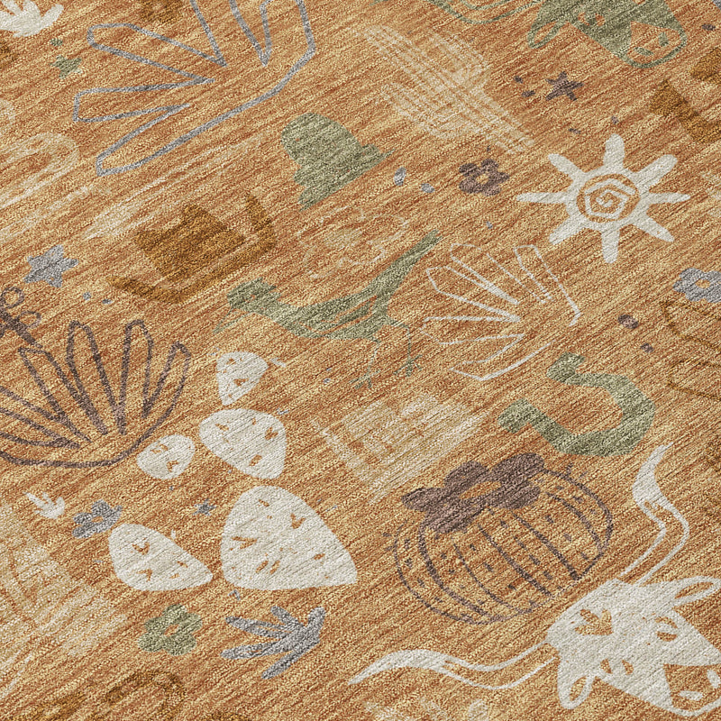 Close-up of round rug pattern with cactus and desert icons in copper, teal, and white