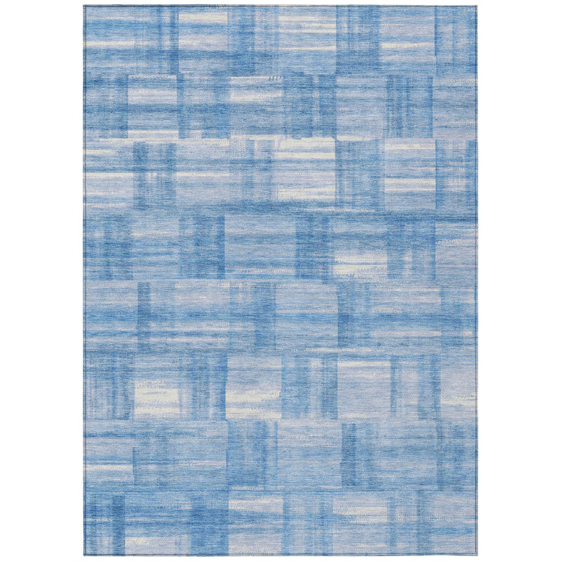 Blue and ivory patchwork grid area rug with flat, even edges