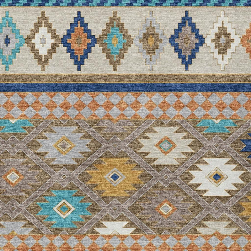 Geometric southwestern area rug close-up with diamond and zigzag motifs in blue and tan
