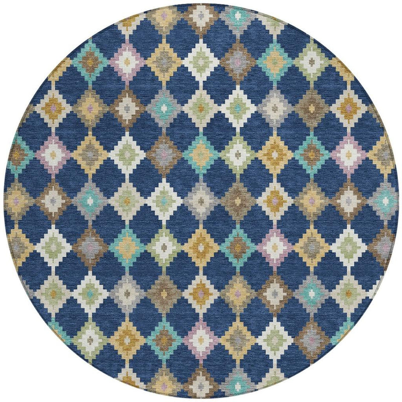 Round area rug with blue geometric diamond pattern and multicolor accents.