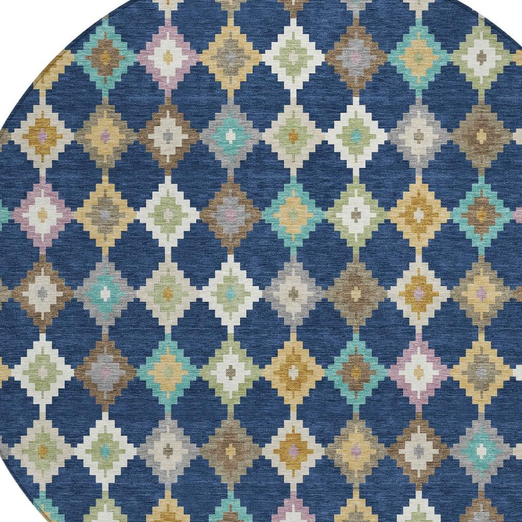 Close-up of round area rug showing blue diamond motif with multicolor details.