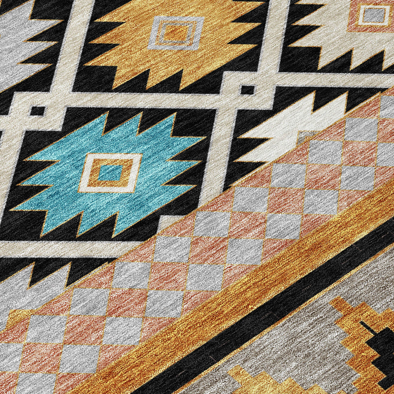 Southwestern area rug close-up with tan-and-orange checker blocks, black lines, and gray field.