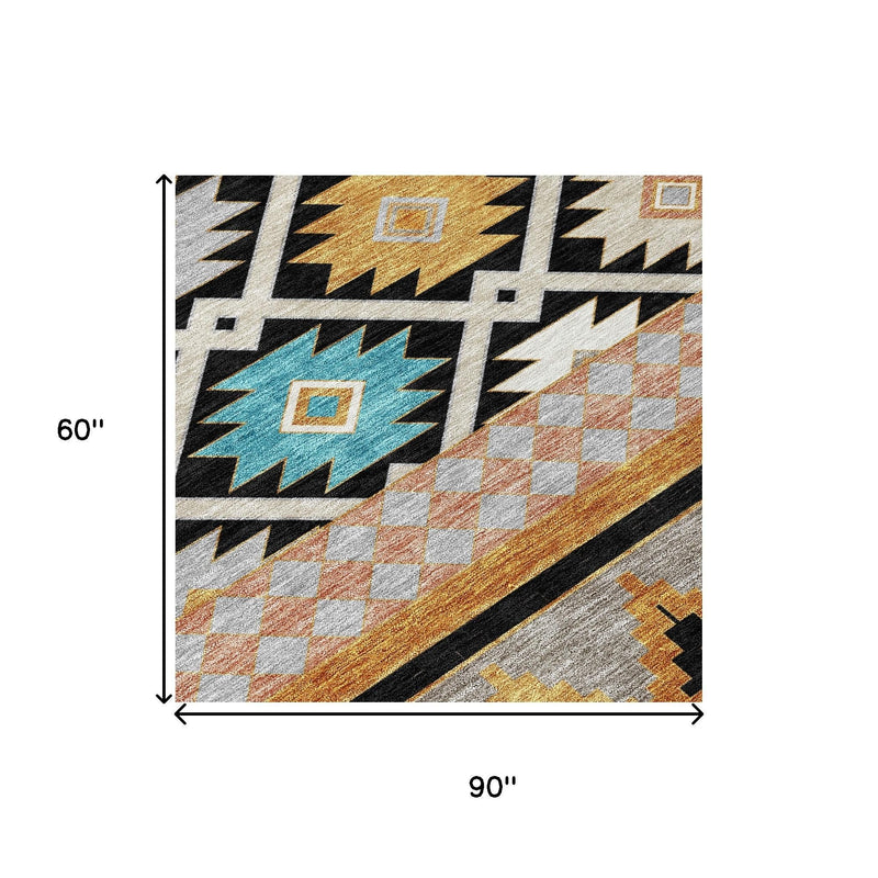 Southwestern area rug, 90 in by 60 in, gray base with black and turquoise diamond patterns.
