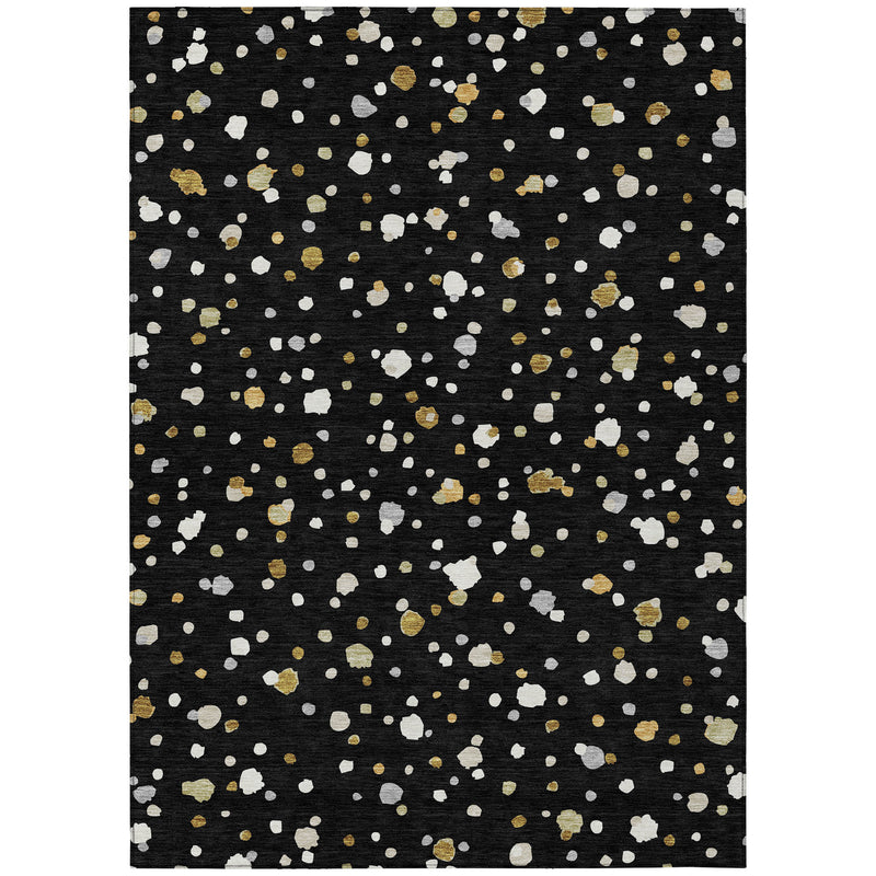 Black washable area rug featuring scattered white and gold geometric shapes