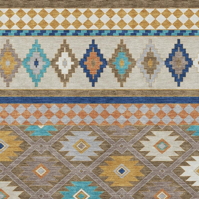 Southwestern area rug close-up with diamond motifs and horizontal stripes in taupe, blue, tan, and teal.