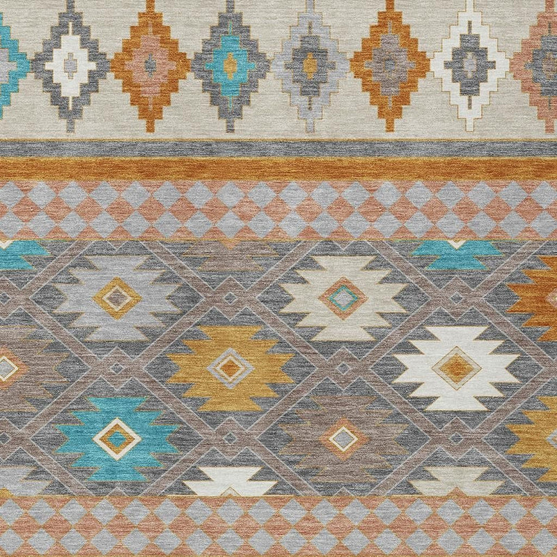 Multicolor southwestern geometric area rug texture in gray, blue, orange, and yellow