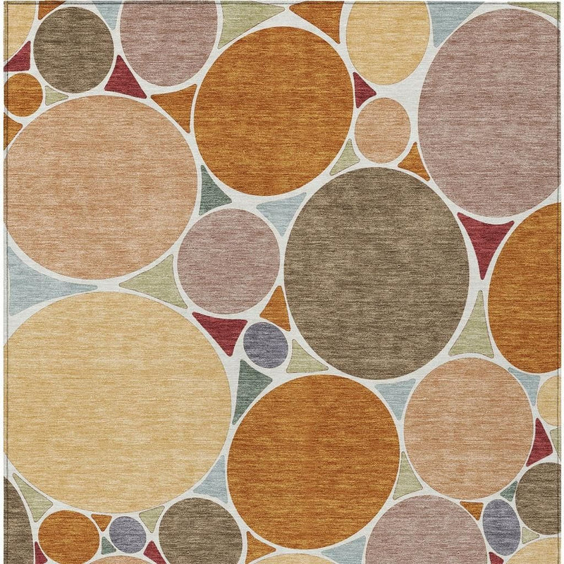 Geometric area rug, full pattern of overlapping circles in warm orange and muted pinks