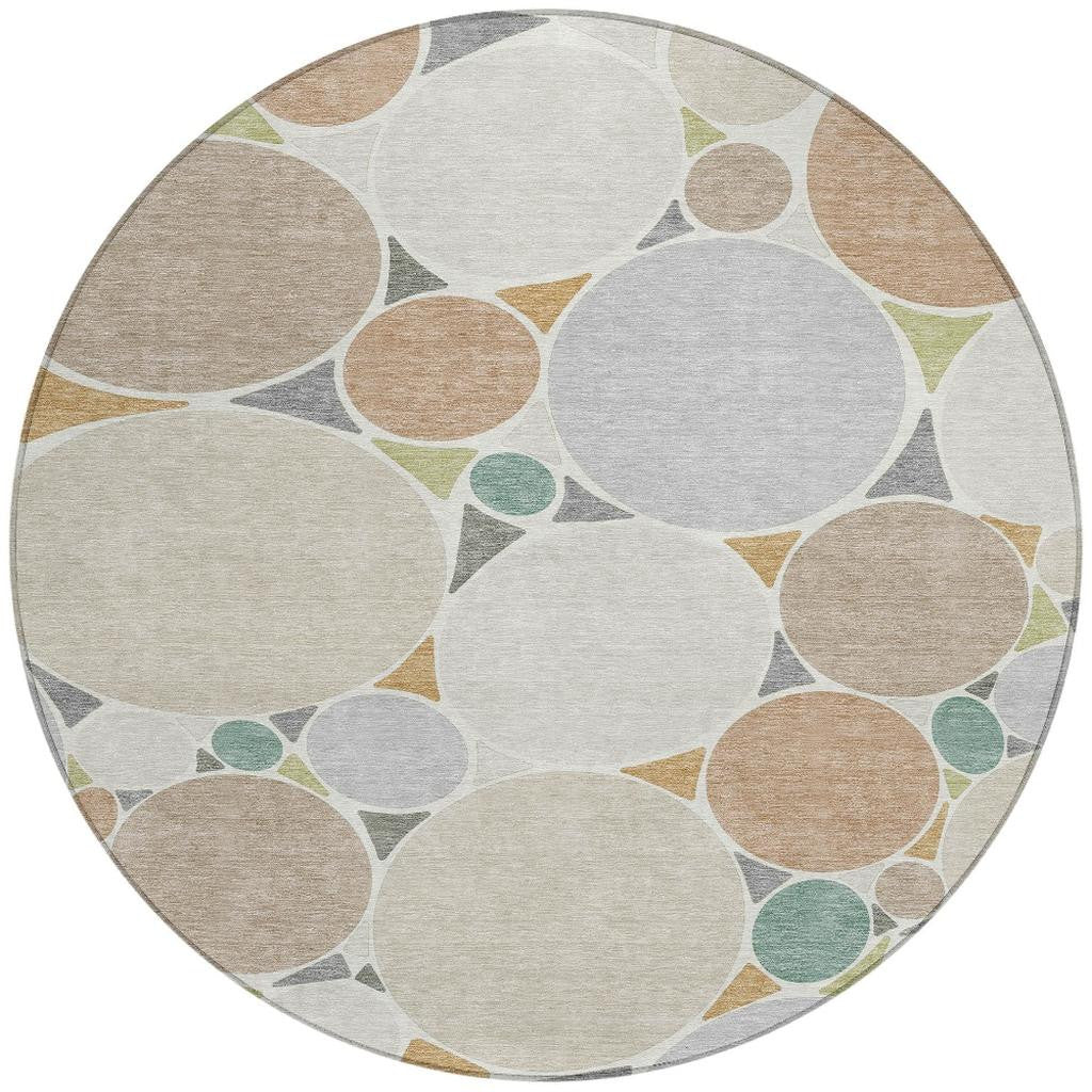 Round area rug with beige, gray, and teal geometric circle pattern, washable indoor/outdoor