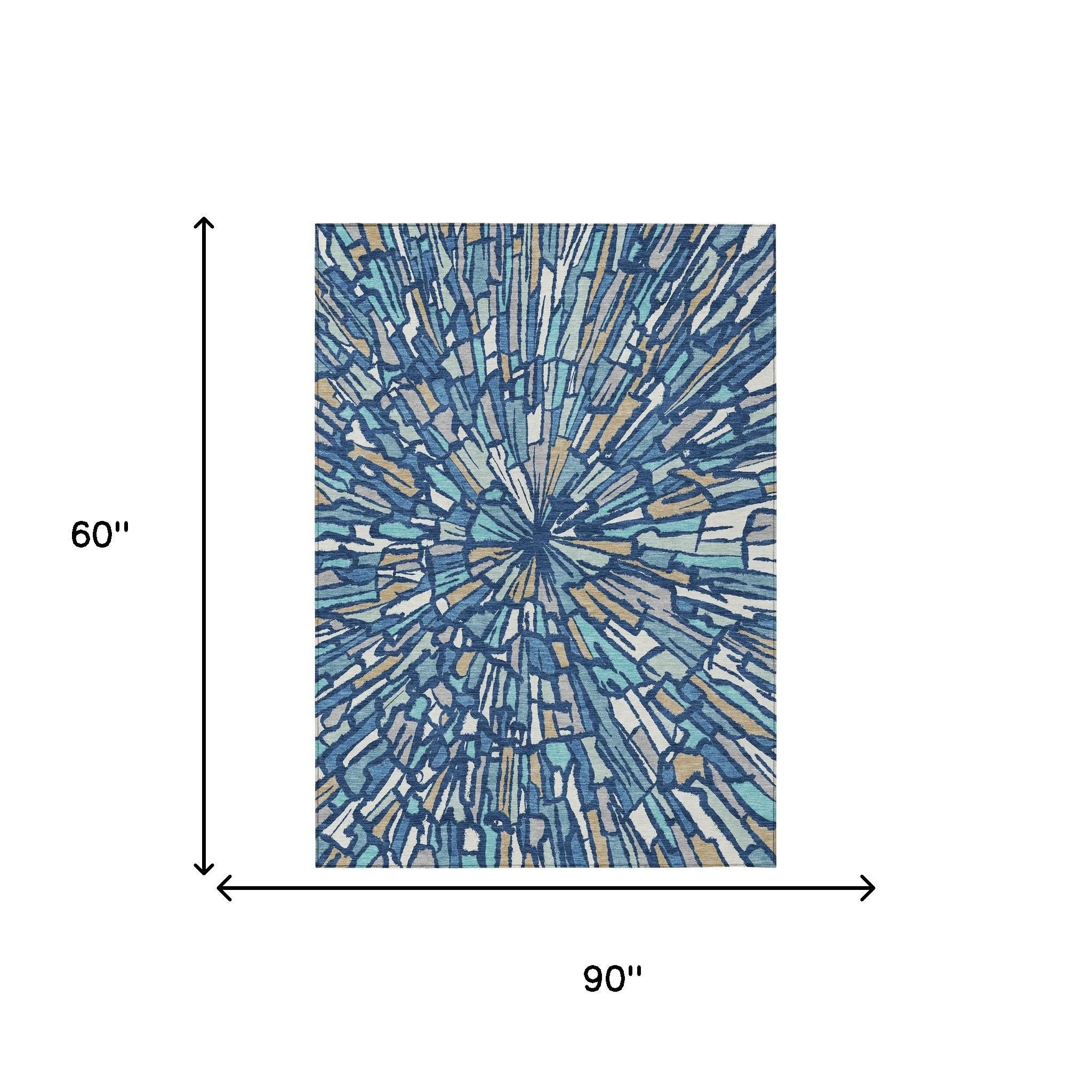 Abstract area rug with blue sunburst pattern; 90 in by 60 in.