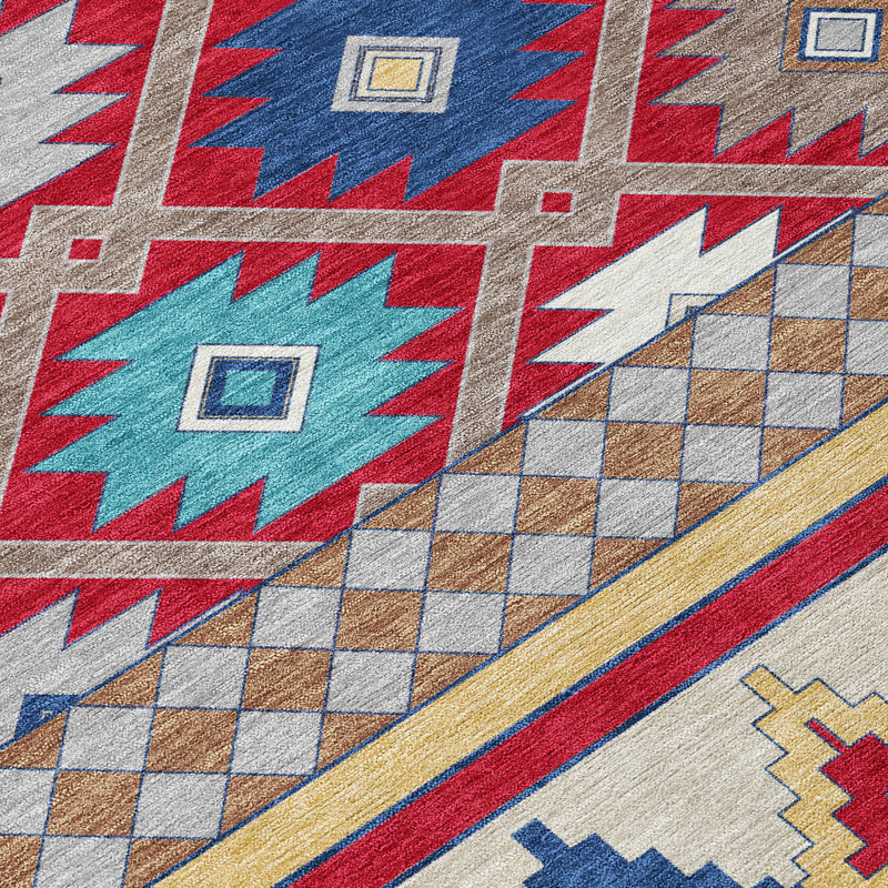 Detail of southwestern rug with red, blue, teal, and ivory cross and checker motifs