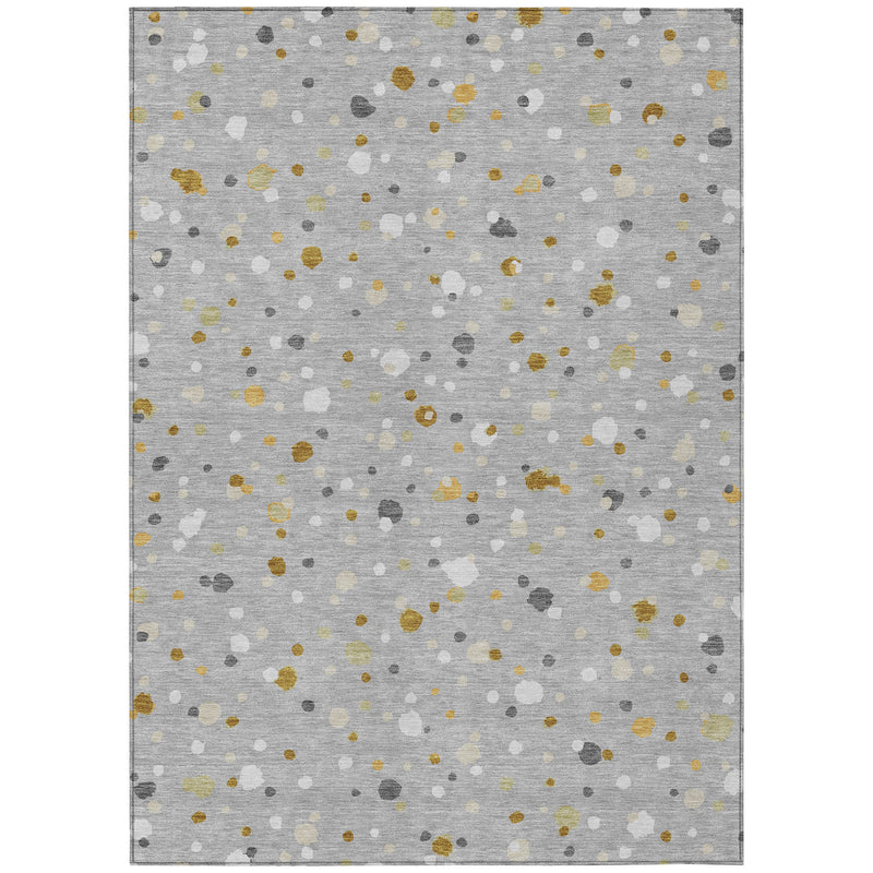 Gray rectangular area rug featuring scattered gold and white speckled geometric pattern
