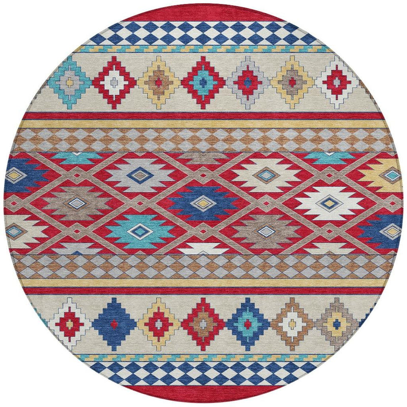 Round southwestern area rug featuring red diamonds, blue borders, and ivory ground