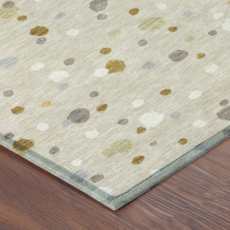 Beige speckle area rug with gold, gray, and blue dots; light blue edge border