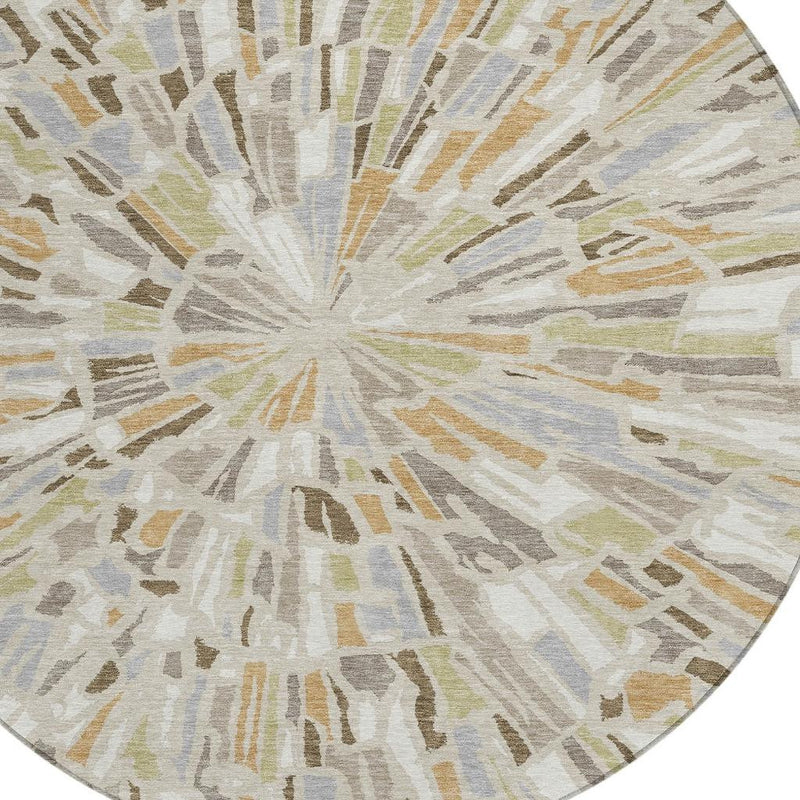 Beige, taupe, and gray round abstract area rug with radial burst pattern