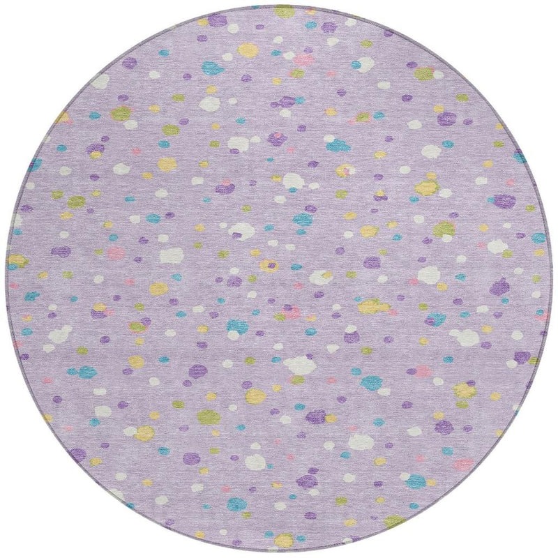 Round lavender indoor outdoor rug with multicolor speckled dot pattern