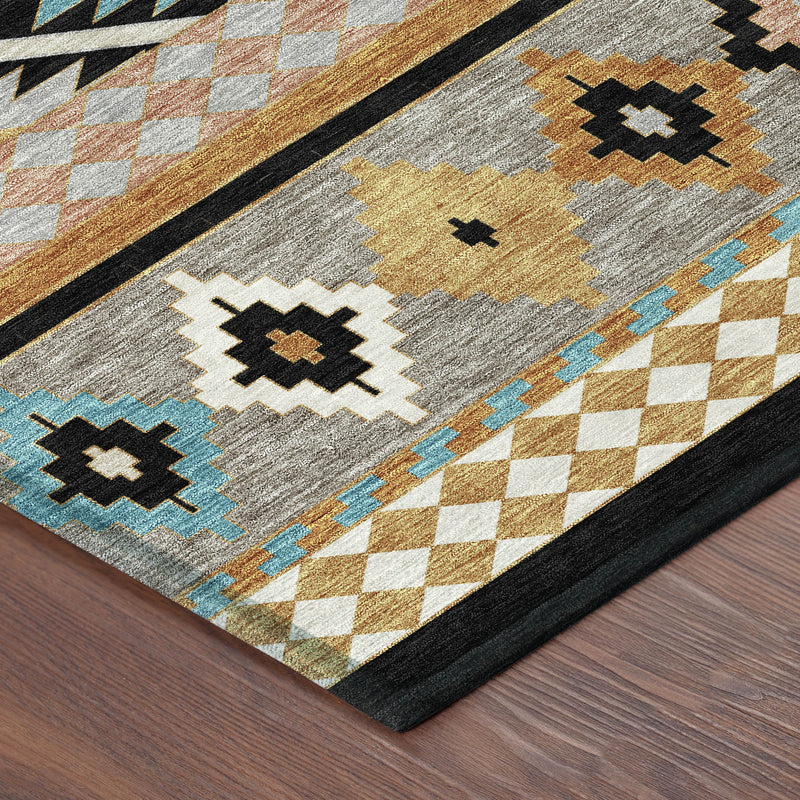 Geometric Southwestern rug section in gray with tan, blue, and black motifs and border
