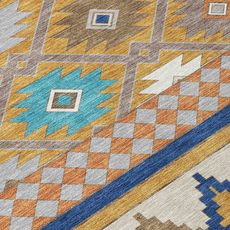 Close-up southwestern rug with diamond, checker, and zigzag motifs in tan, blue, and orange