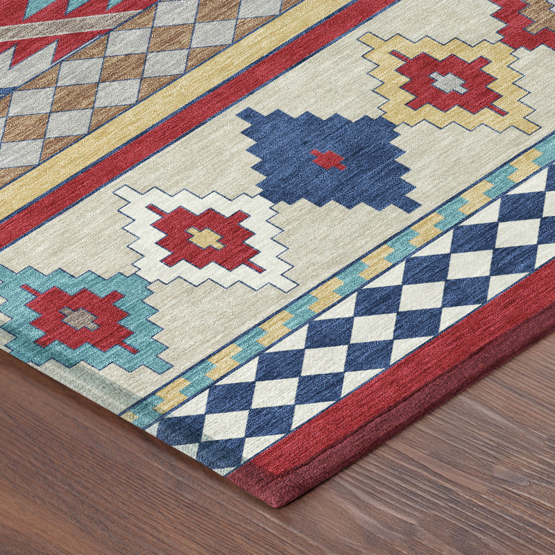 Corner detail of Southwestern area rug in ivory with red, blue, teal and gold geometric motifs.