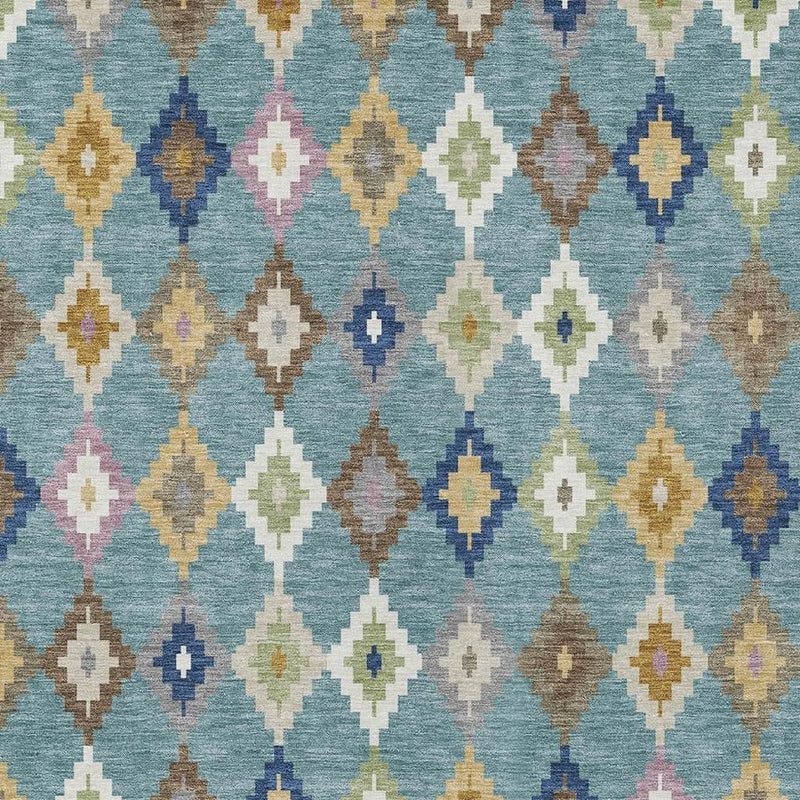 Teal blue rug close-up with repeating multicolor diamond chain pattern